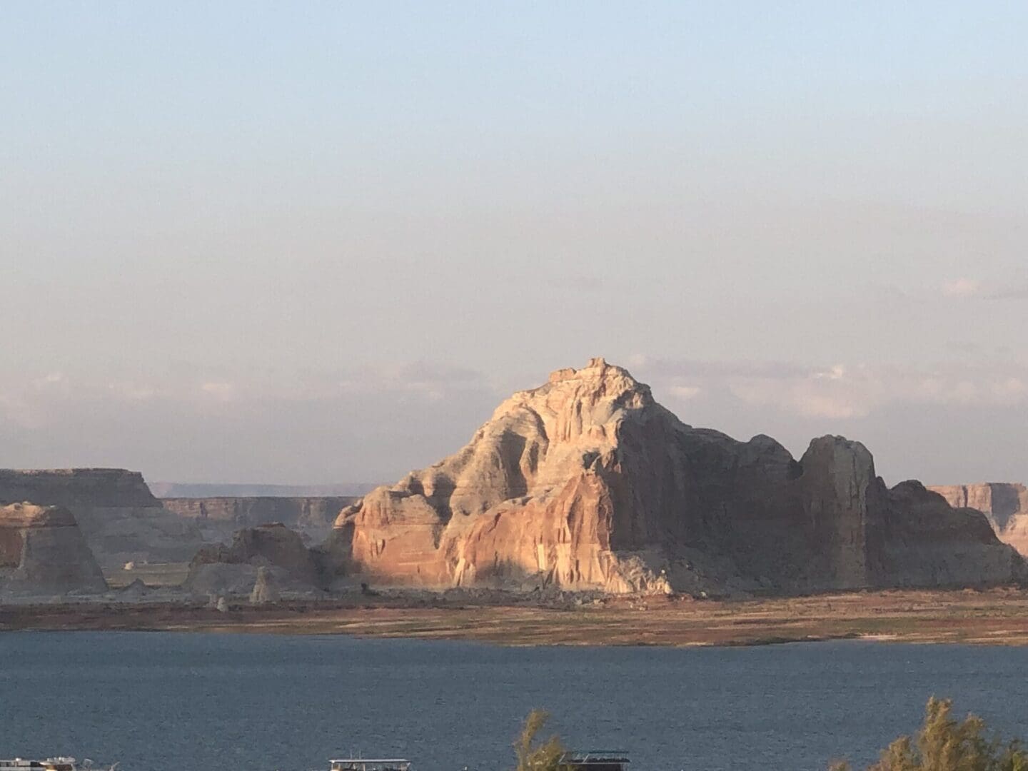 A large rock formation in the middle of nowhere.