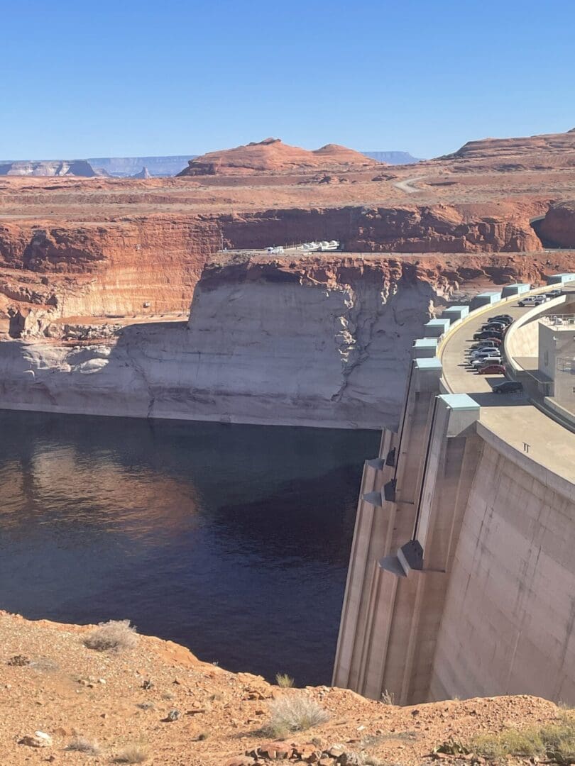 A view of the water from above looking at a bridge.