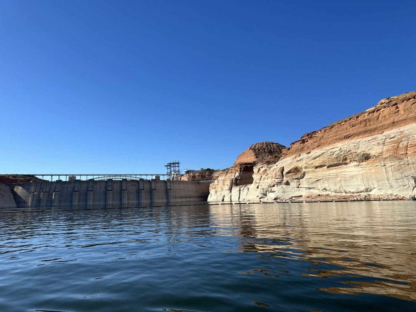 A body of water with a bridge over it.