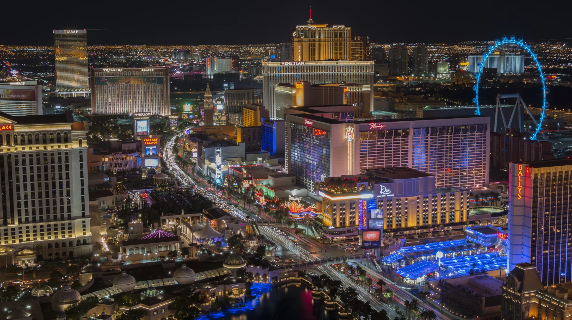 A city with many lights and buildings at night.